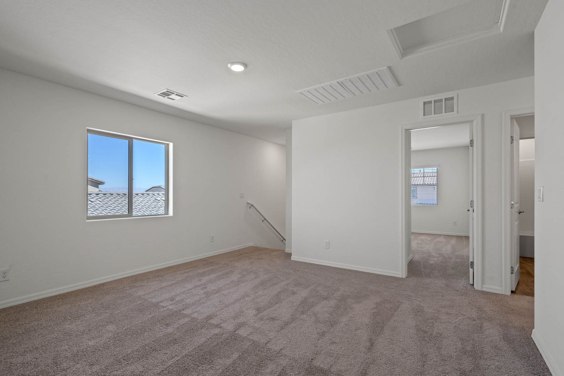 The game room is on the second floor of this home. 