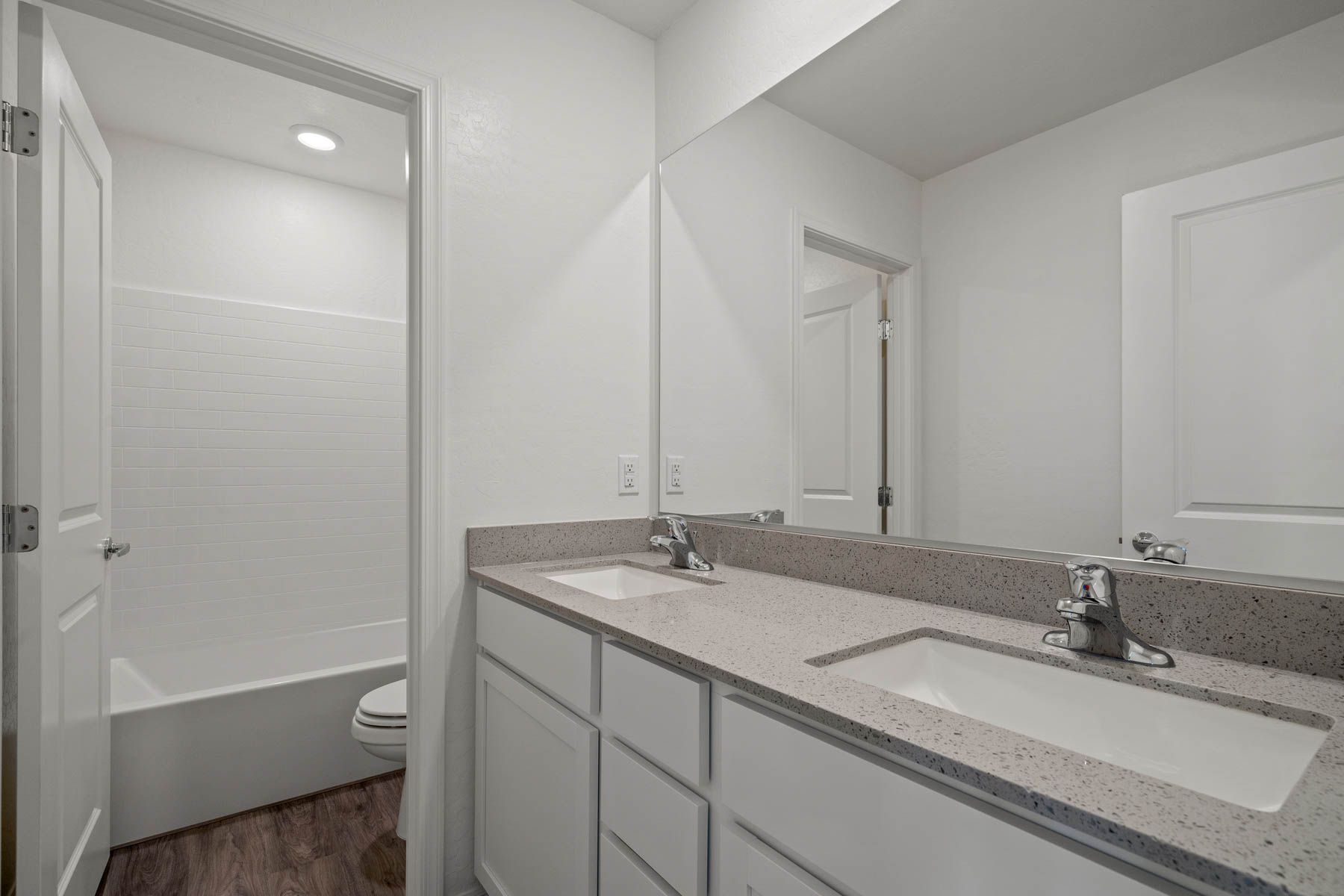 The secondary bathroom has a tub/shower combo!