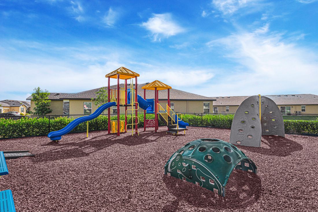 The fenced in playground at Celebration Pointe