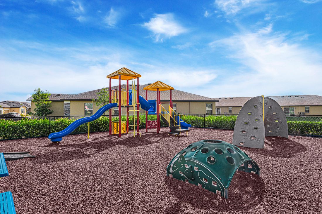 The fenced in playground at Celebration Pointe