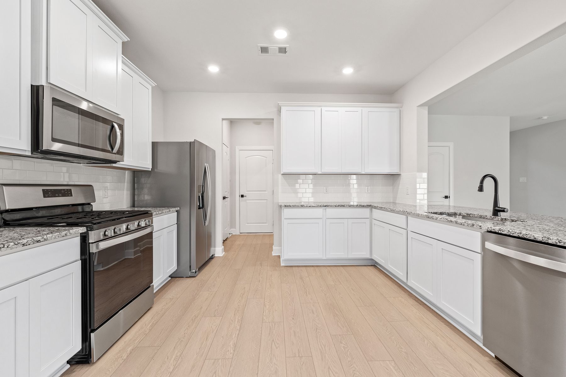 The kitchen of the Rayburn has energy-efficient appliances.