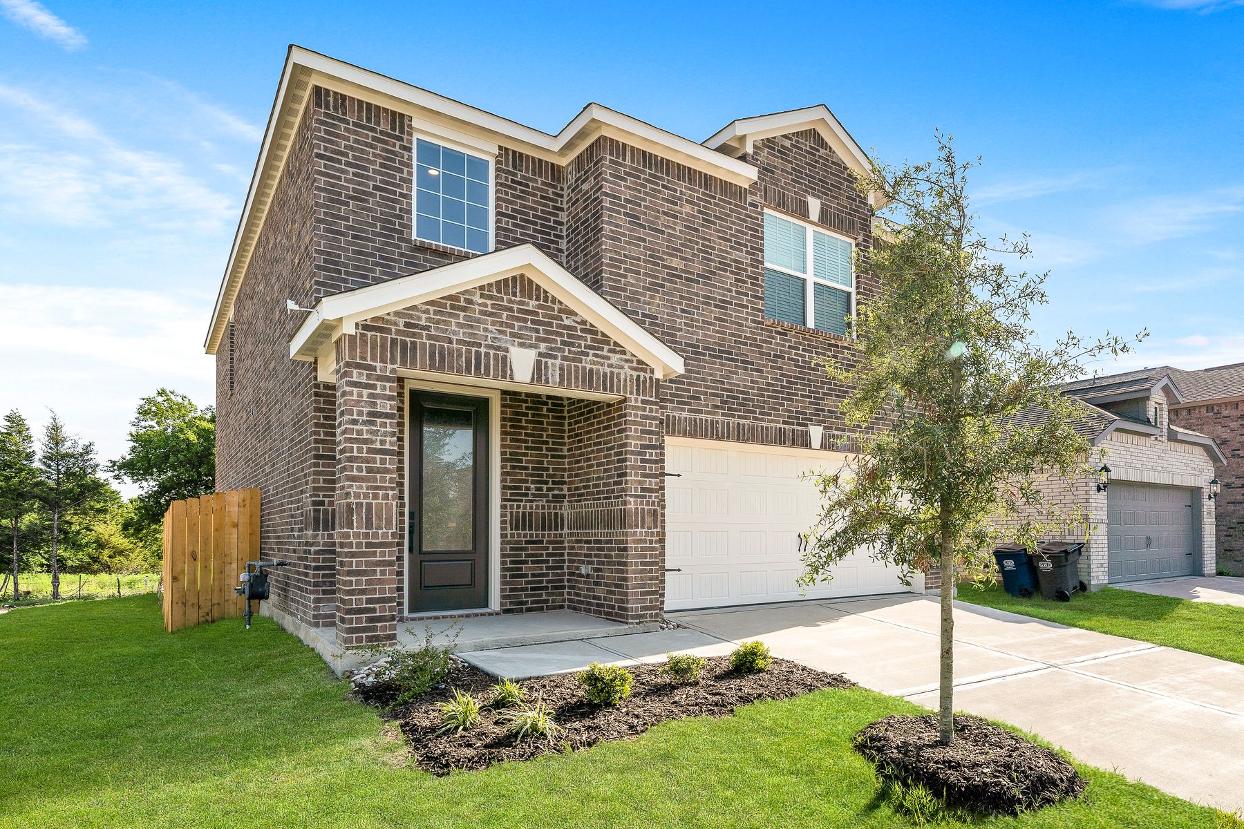The Rayburn is a beautiful two-story home.