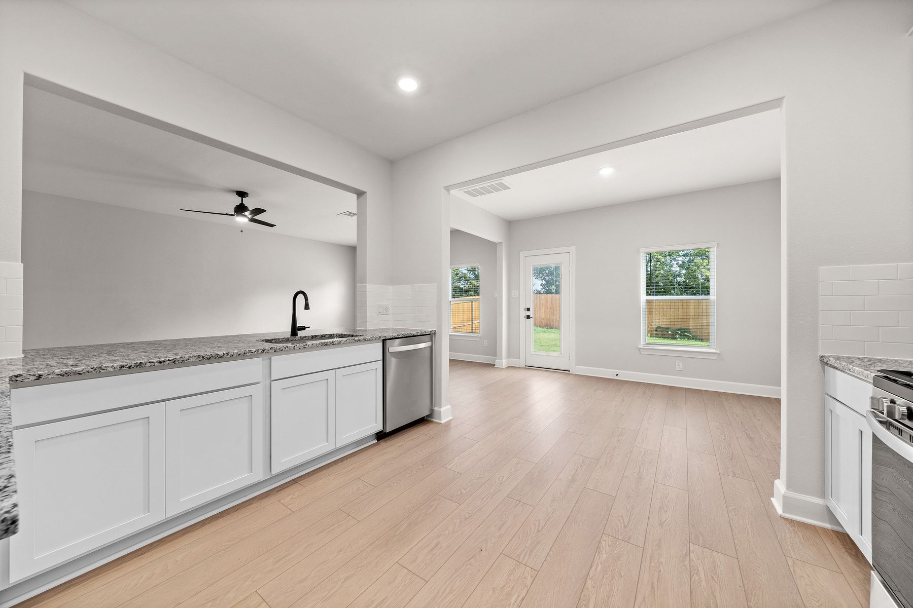 The kitchen of the Rayburn has sprawling granite countertops.