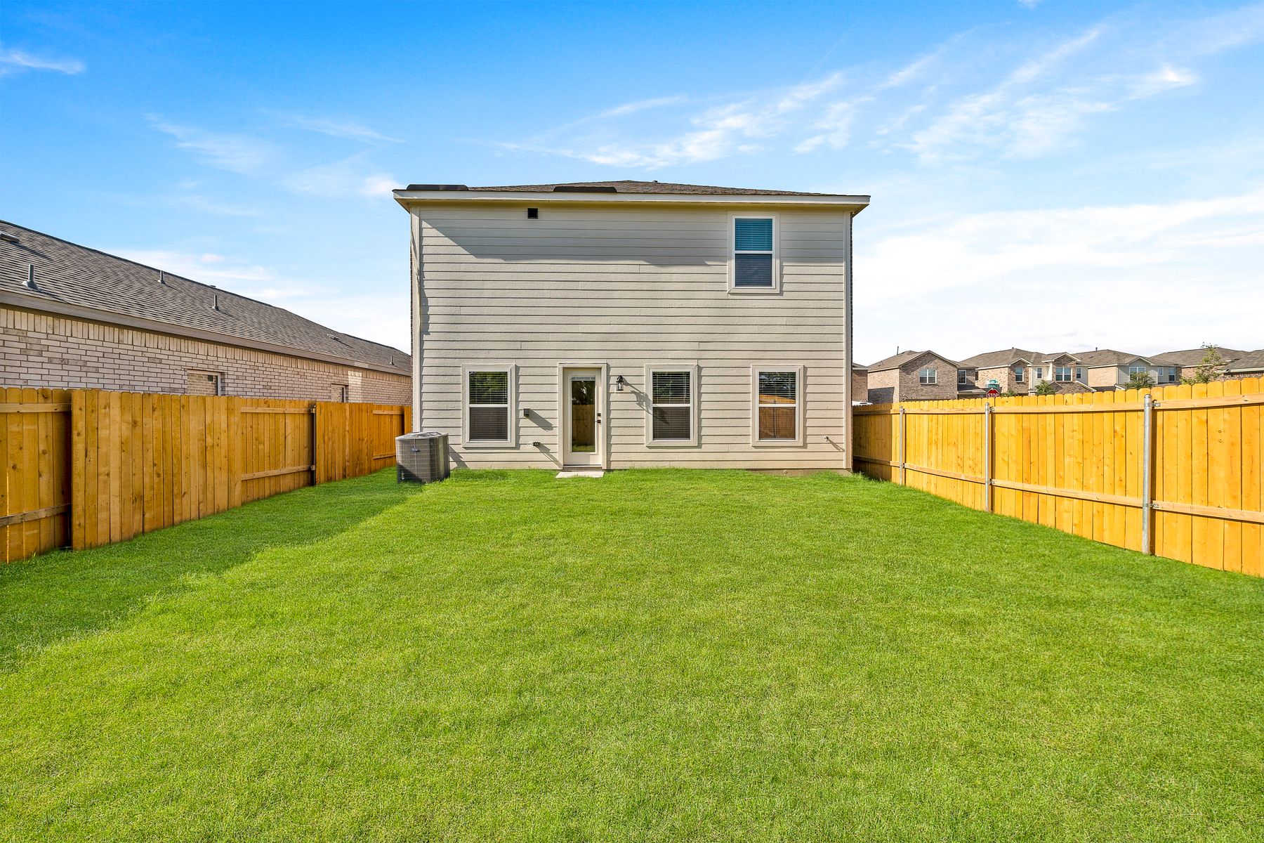 The back yard of the Rayburn is fully fenced.