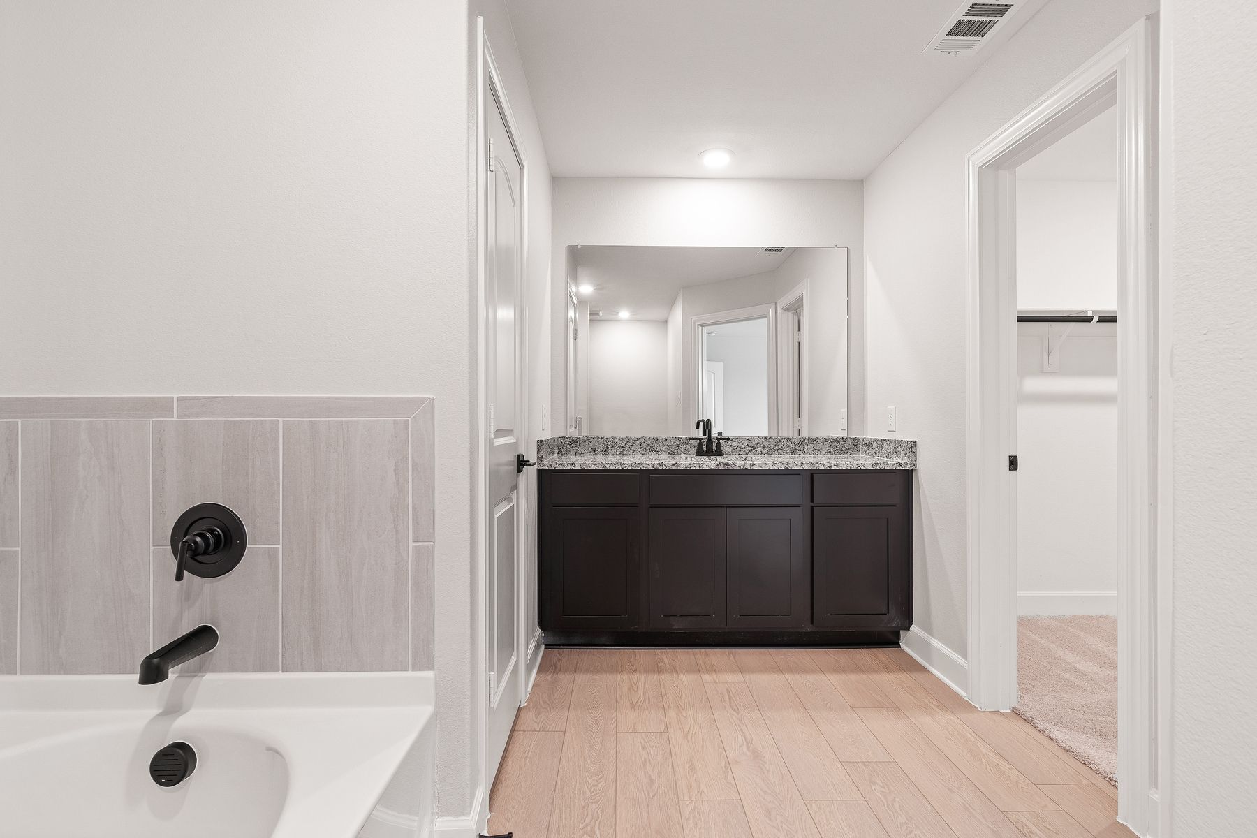 The master bathroom of the Rayburn has great vanity space.