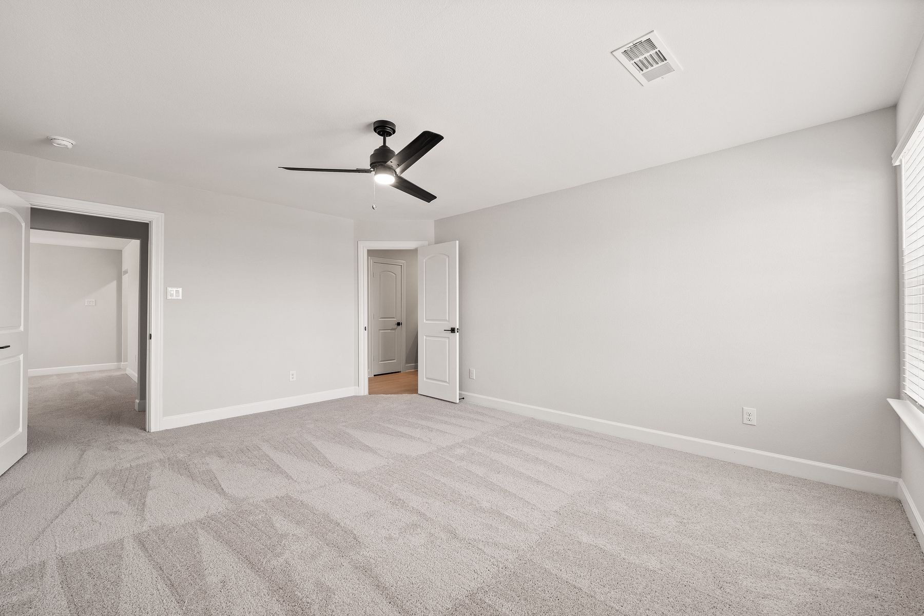The master suite has a bedroom, private bathroom and walk-in closet.