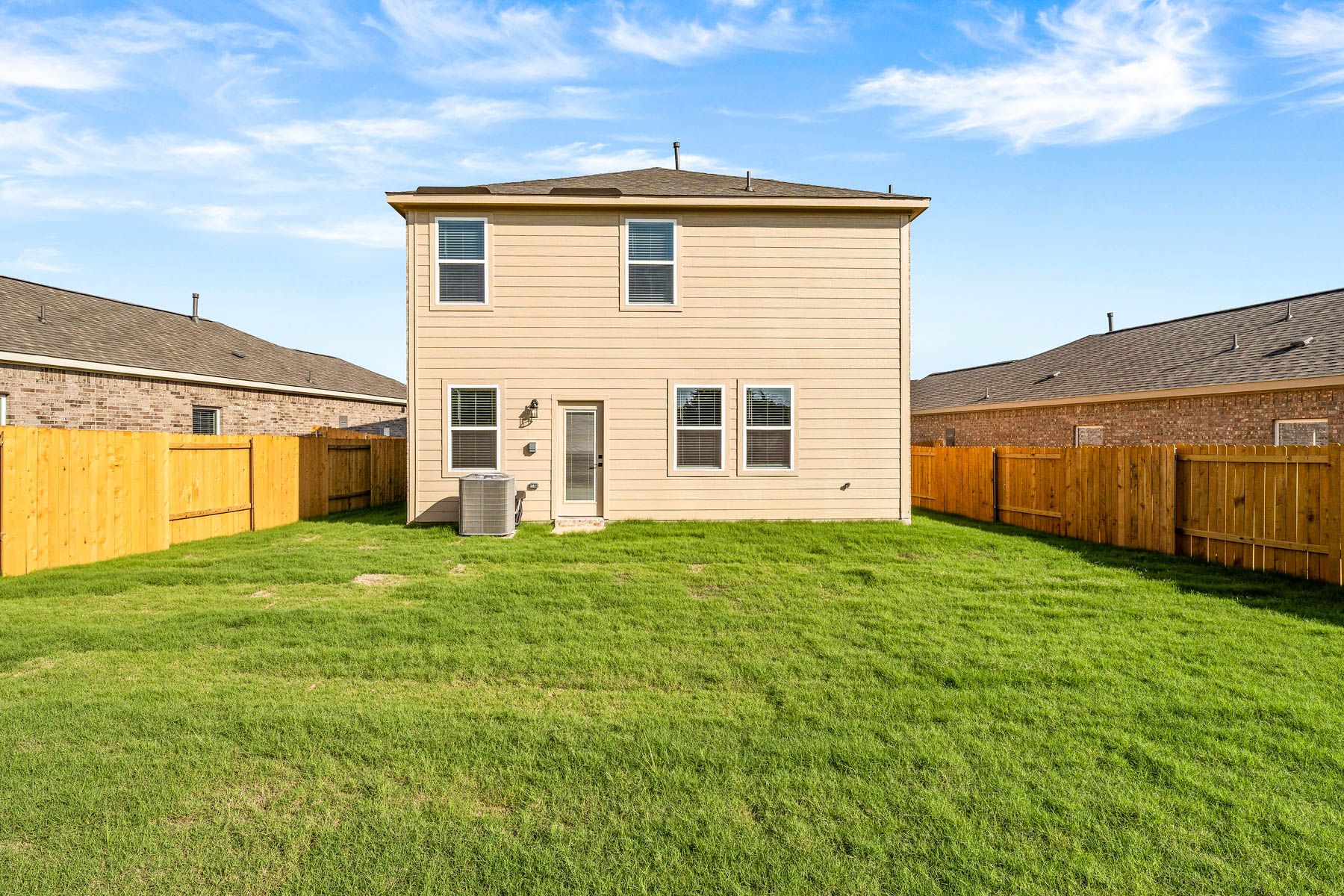 The back yard of the Yaupon is fully fenced.