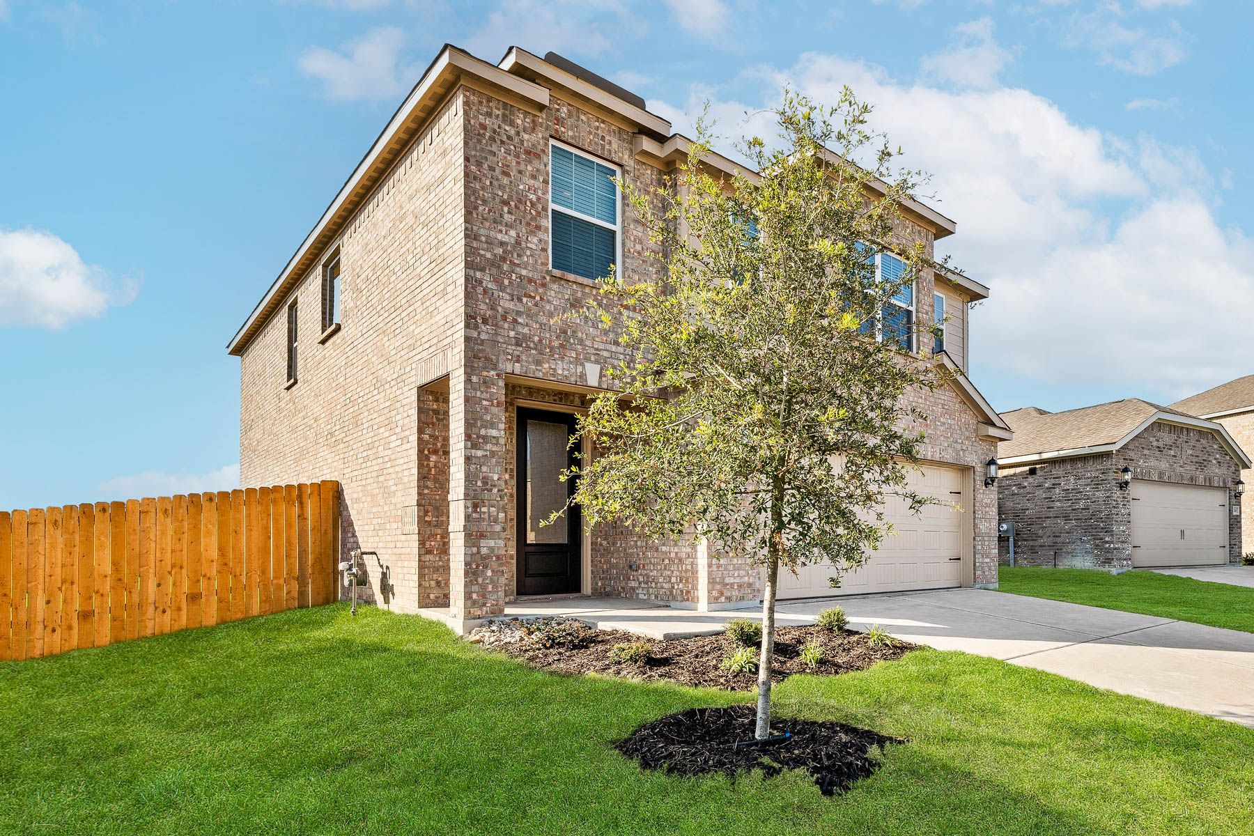 The Yaupon is a beautiful two-story floor plan.