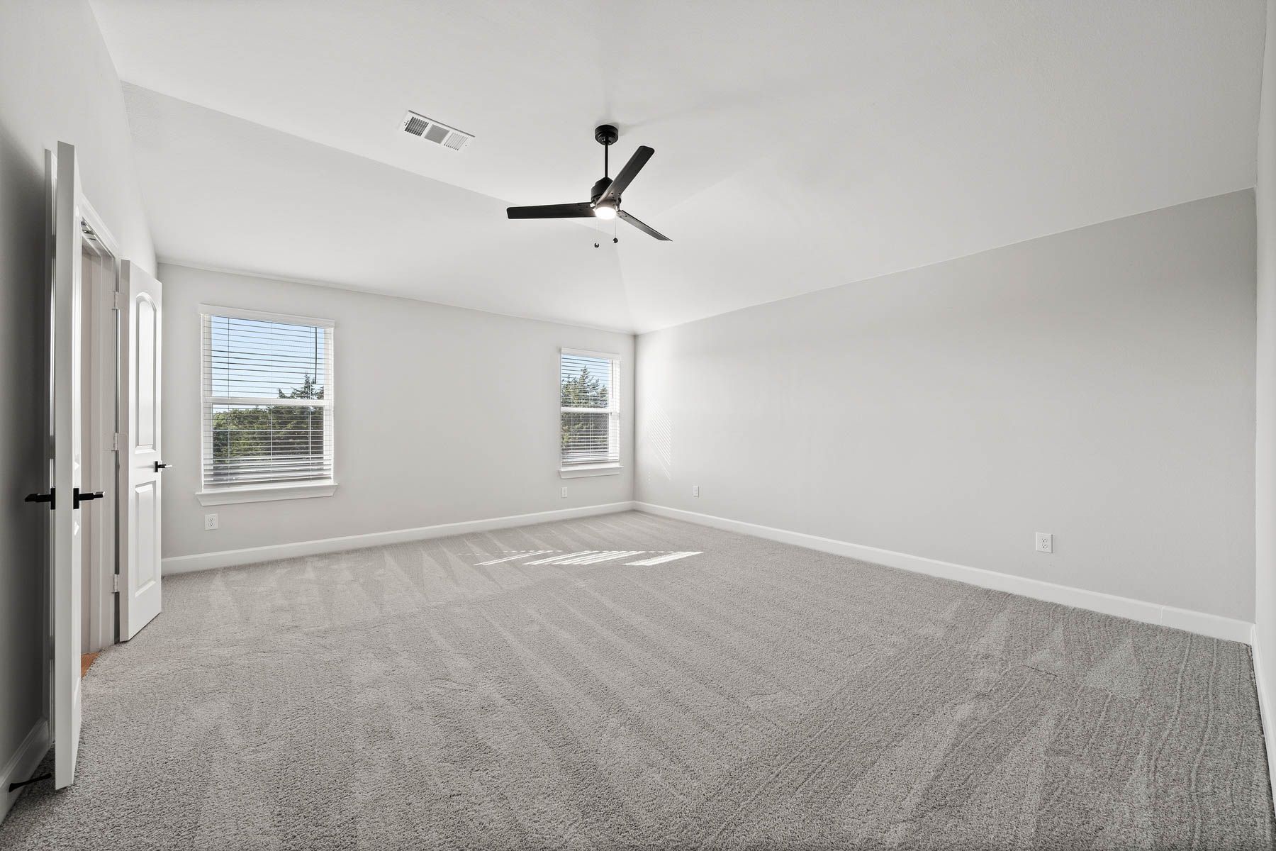 The master bedroom has two windows that create great natural light.