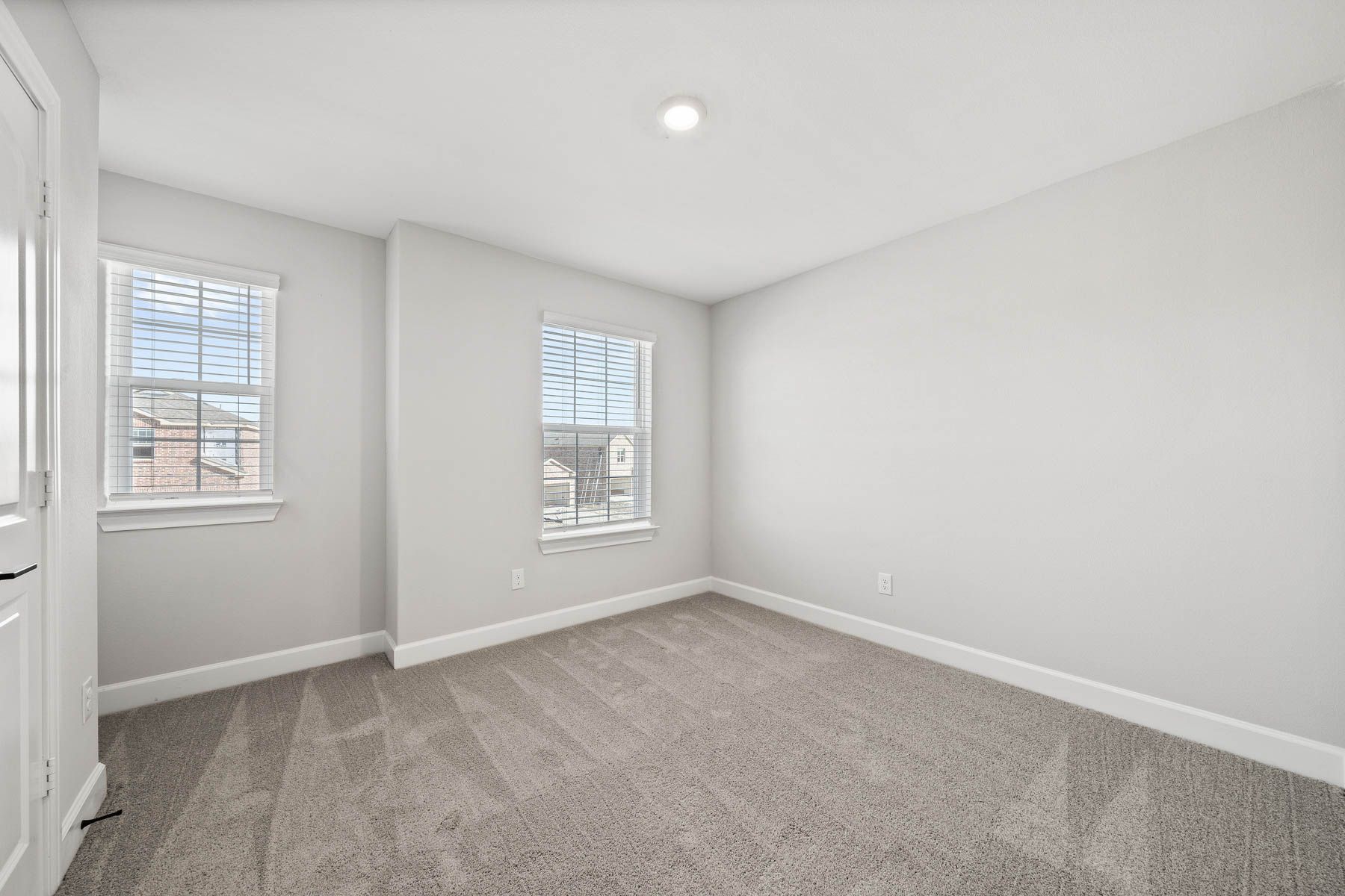 The secondary bedrooms are a great space for a child's bedroom or as a guest room. 