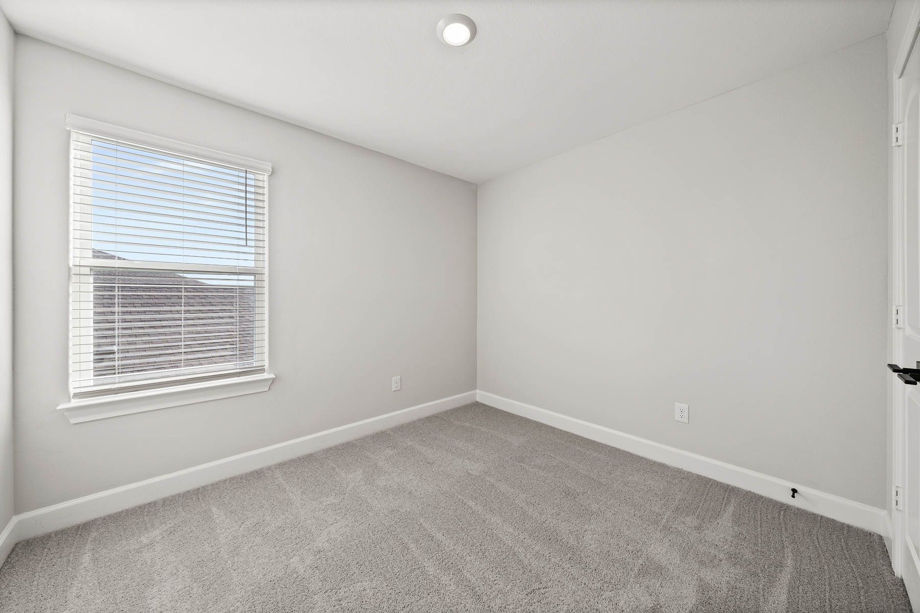 The secondary bedrooms are a great space for a child's bedroom or as a guest room. 