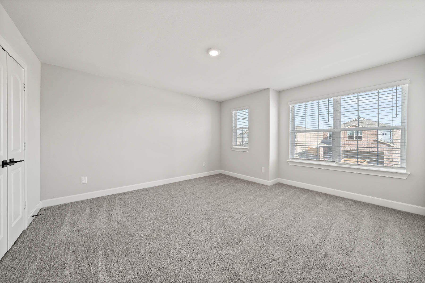The secondary bedrooms are a great space for a child's bedroom or as a guest room. 
