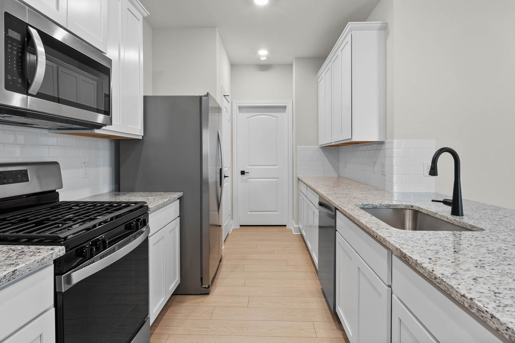 The kitchen of the Cedar has energy-efficient appliances.