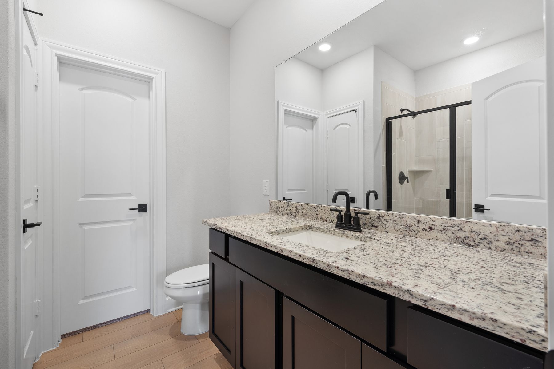 The master bathroom of the Piper has a large vanity.
