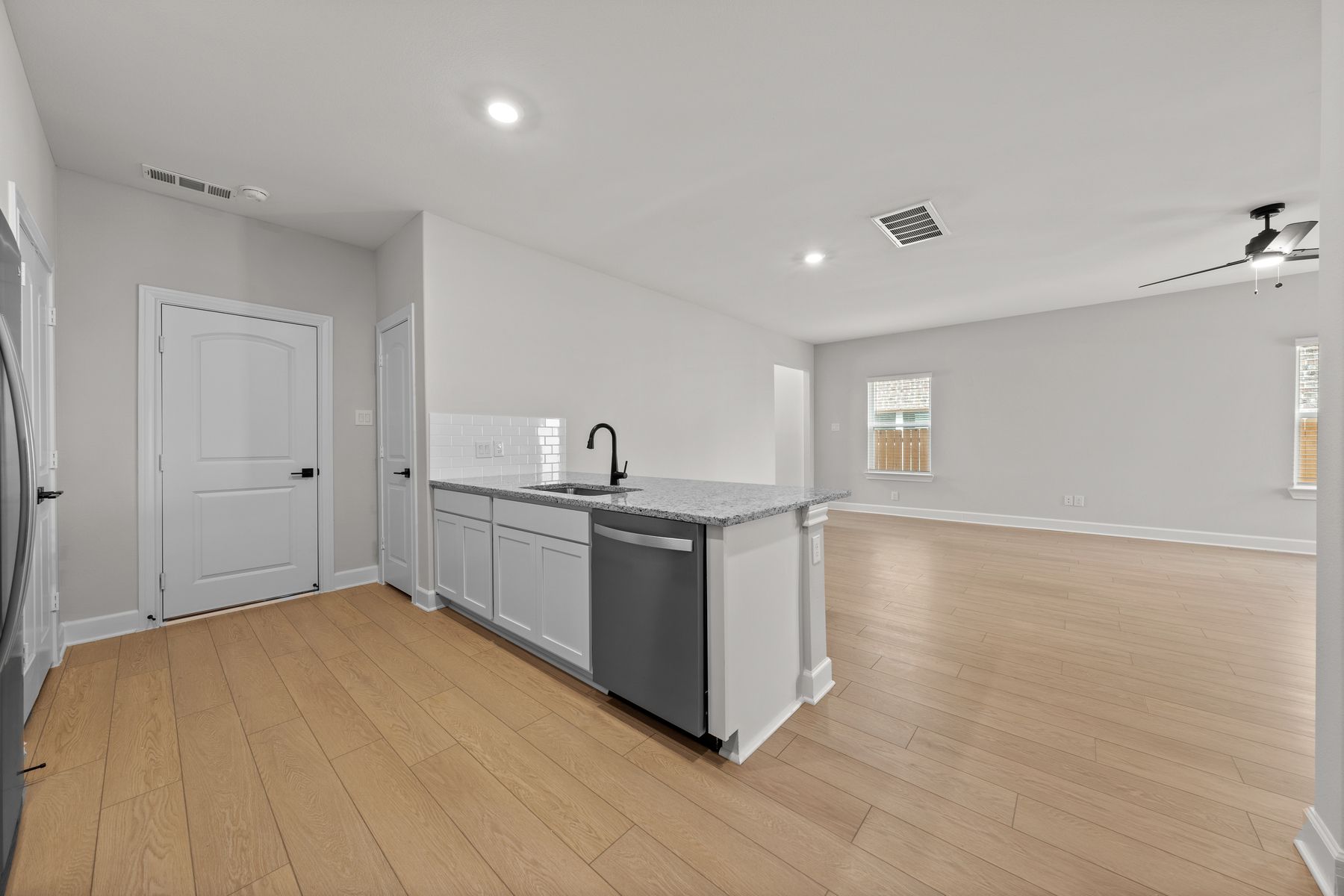 The family room of the Willows sits adjacent to the kitchen.