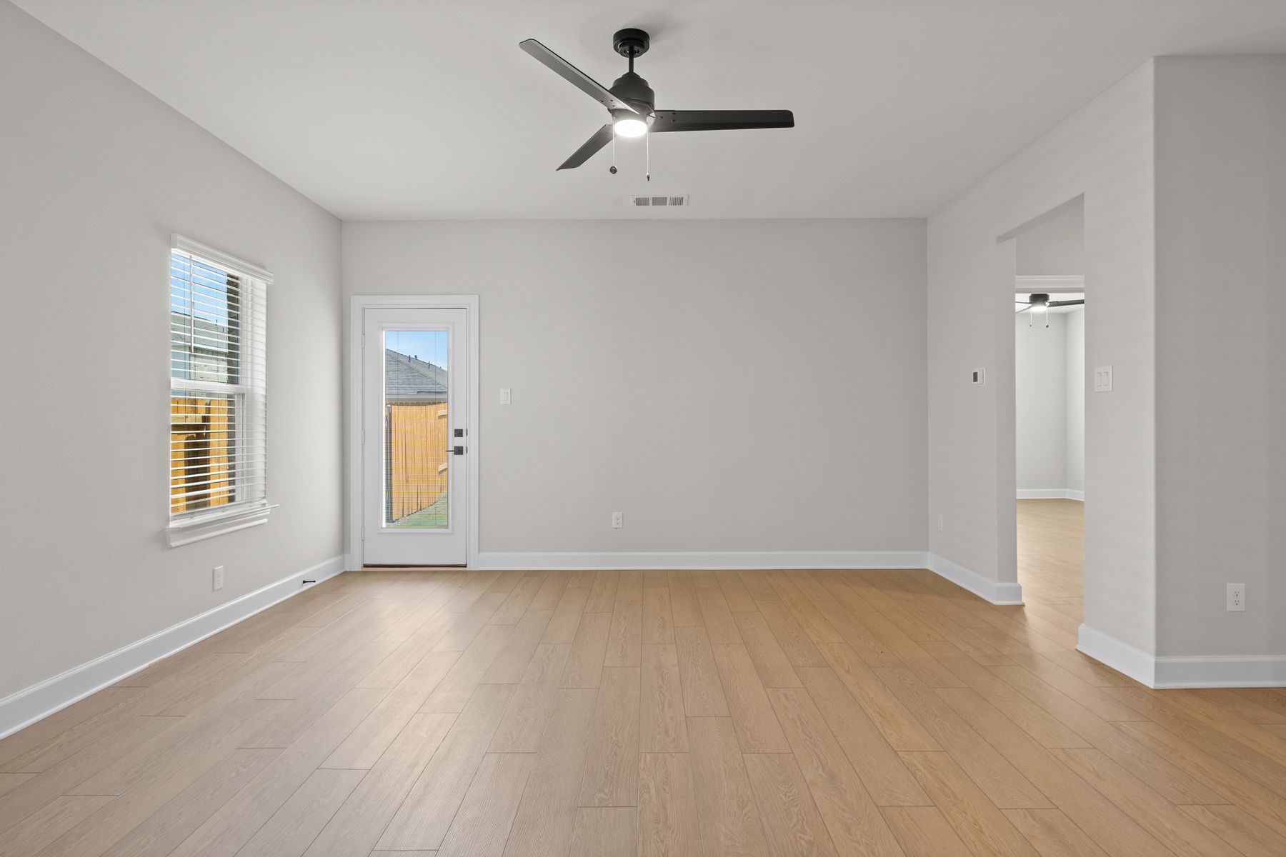 The dining room of the Willow sits adjacent to the family room.