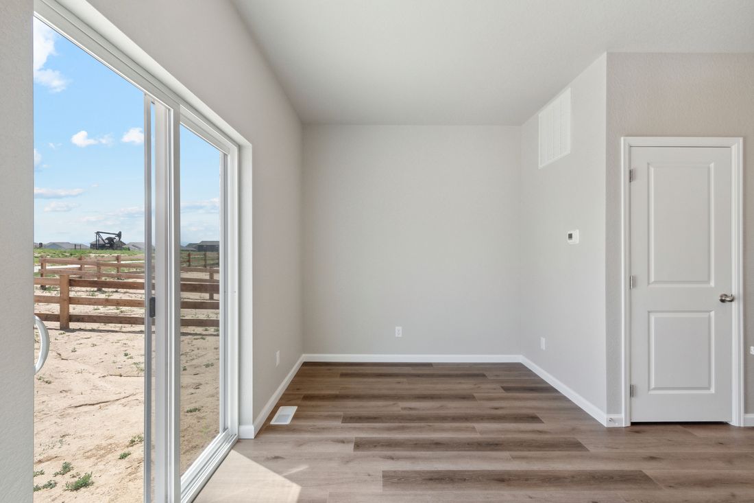 The sliding glass doors of the Platte let in great light and back yard views.