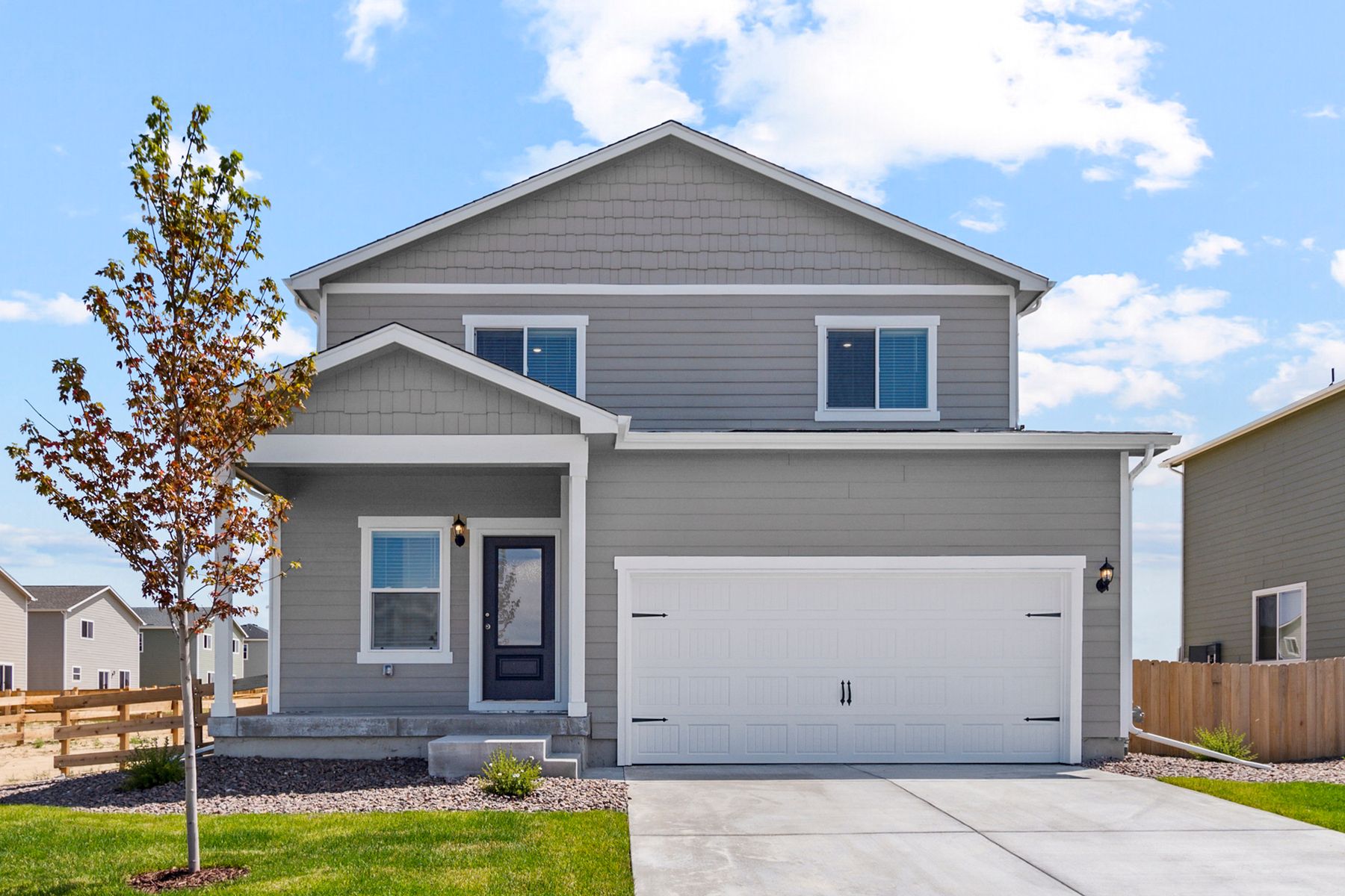 The Laramie is a beautiful two-story home with siding.