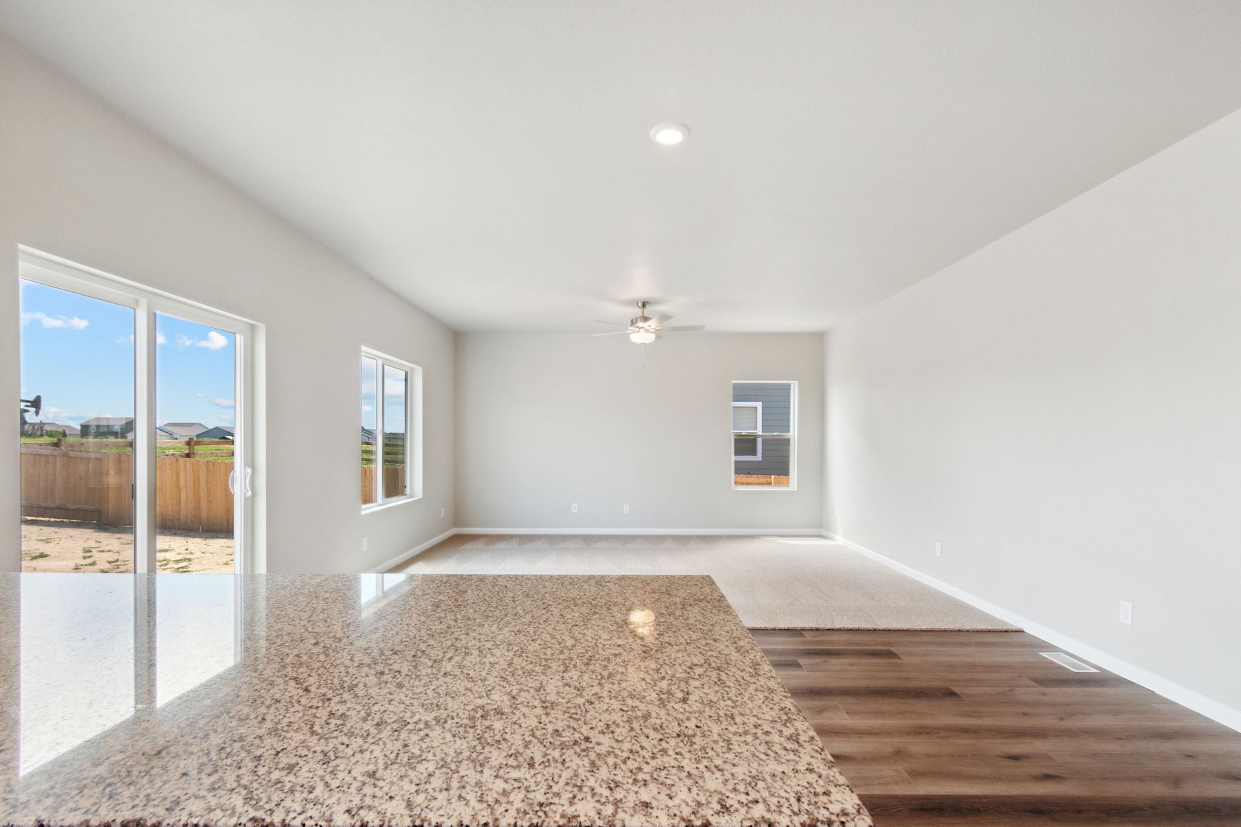 The family room is spacious and has plenty of room for furniture.
