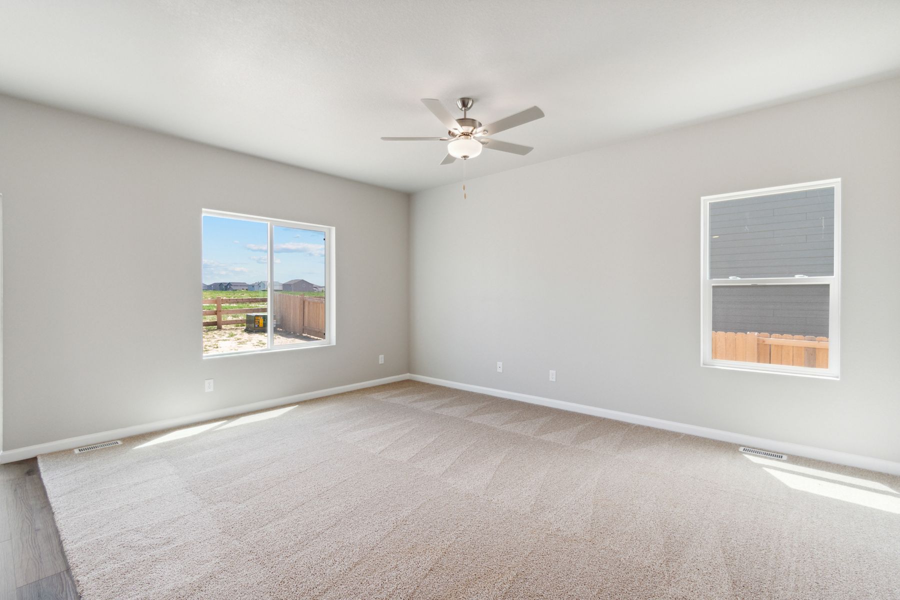 The windows in the dining room and family room let in great natural light.