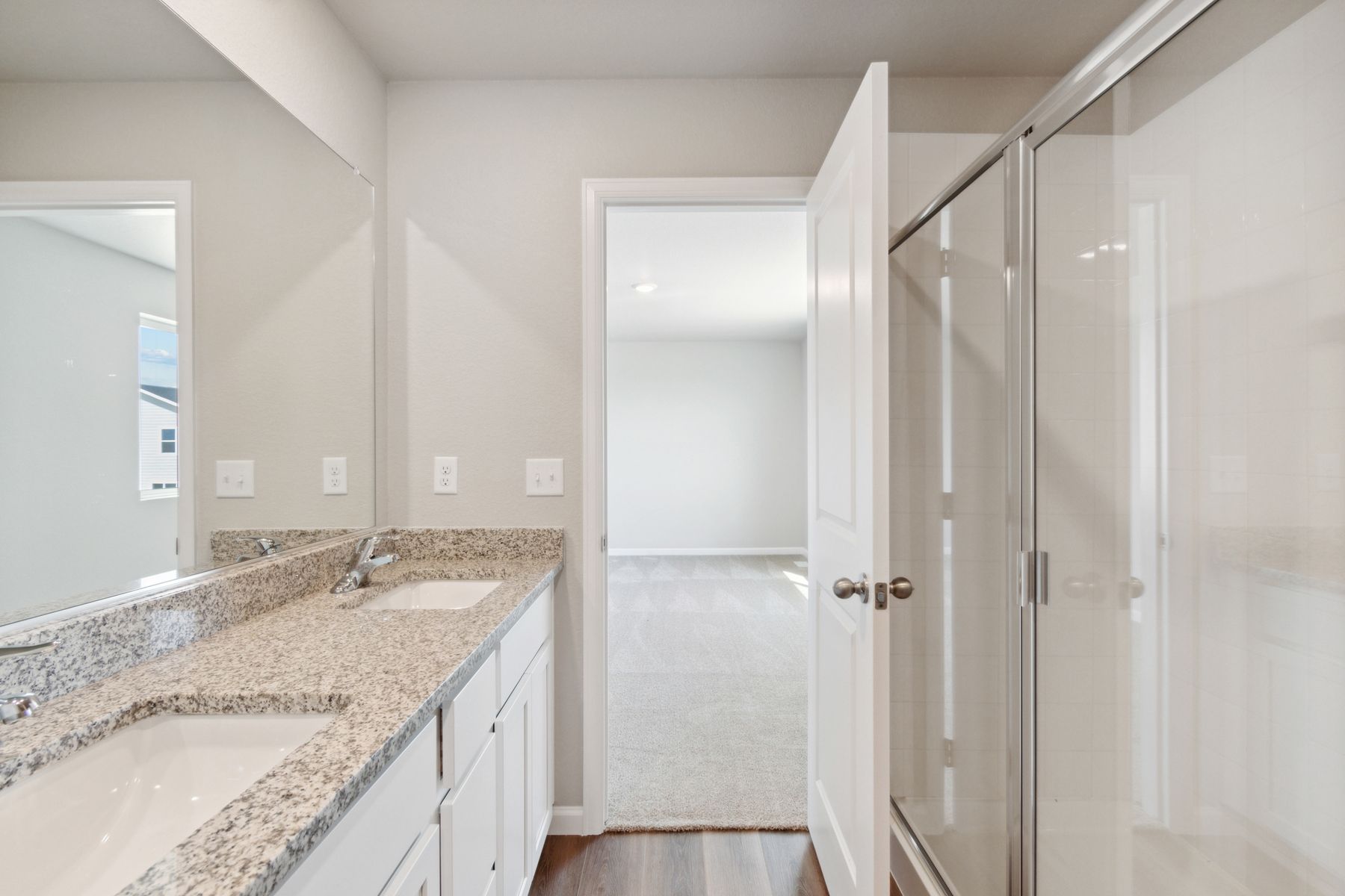 The master bathrom of the Laramie has walk-in, glass showers.