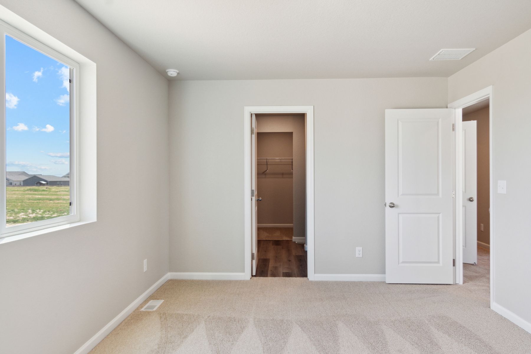 The master suite includes a bedroom, bathroom and walk-in closet.