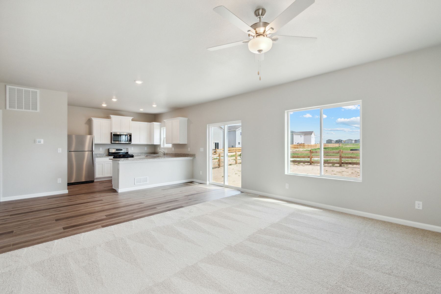 The first floor of the Laramie floor plan is an open-concept layout.