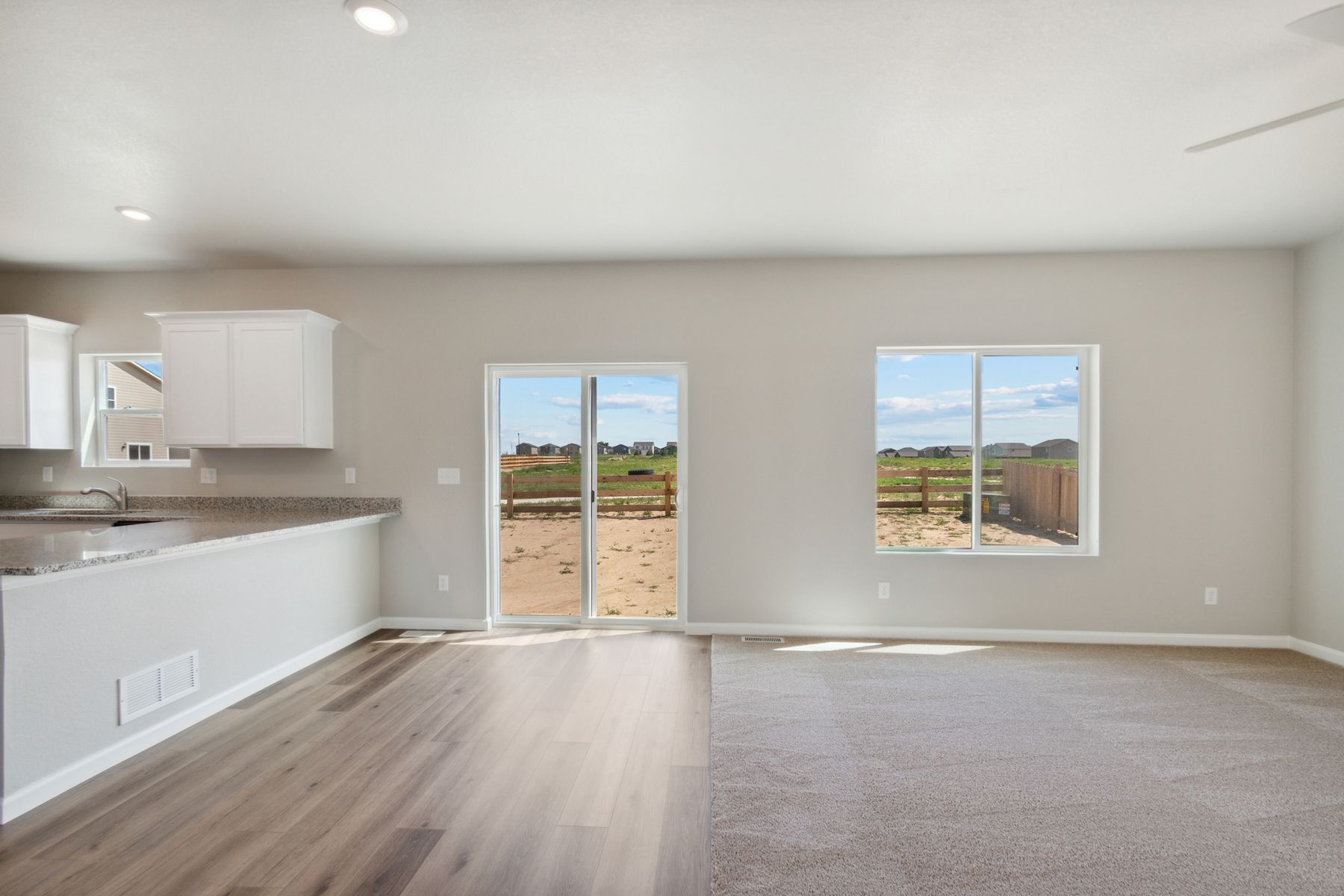 The windows in the dining room and family room let in great natural light.