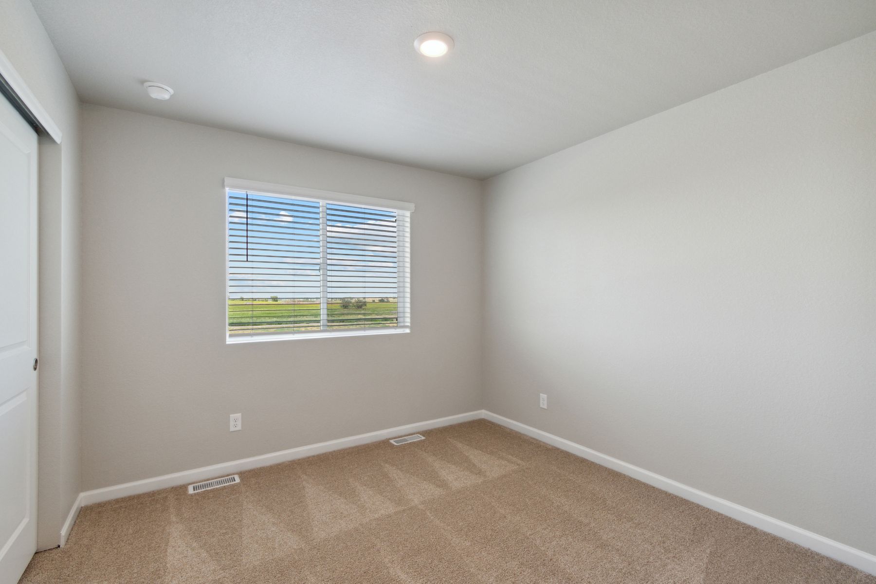 The secondary bedrooms of the Laramie are a great space for children's bedrooms or as guest rooms.