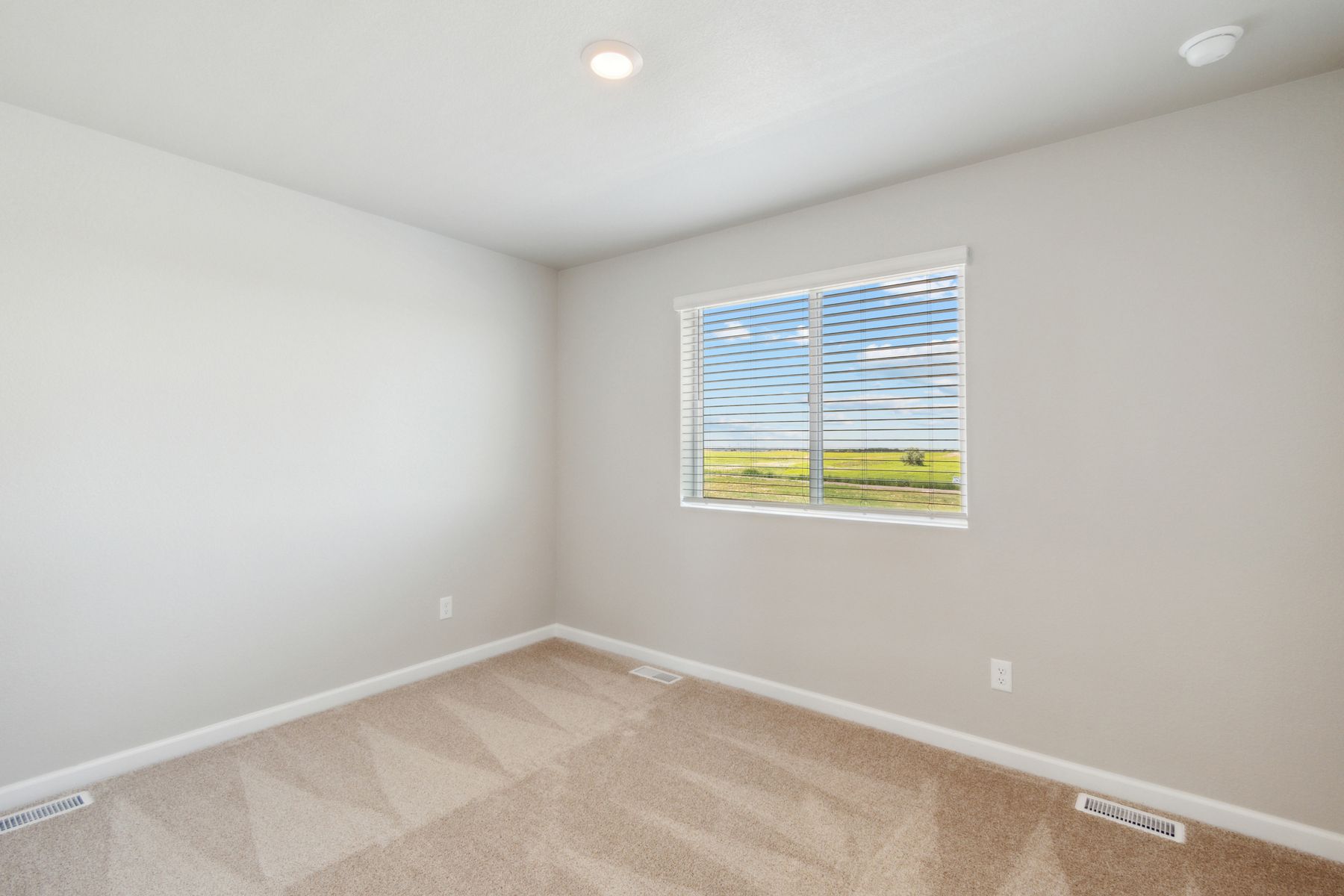 The secondary bedrooms of the Laramie are a great space for children's bedrooms or as guest rooms.