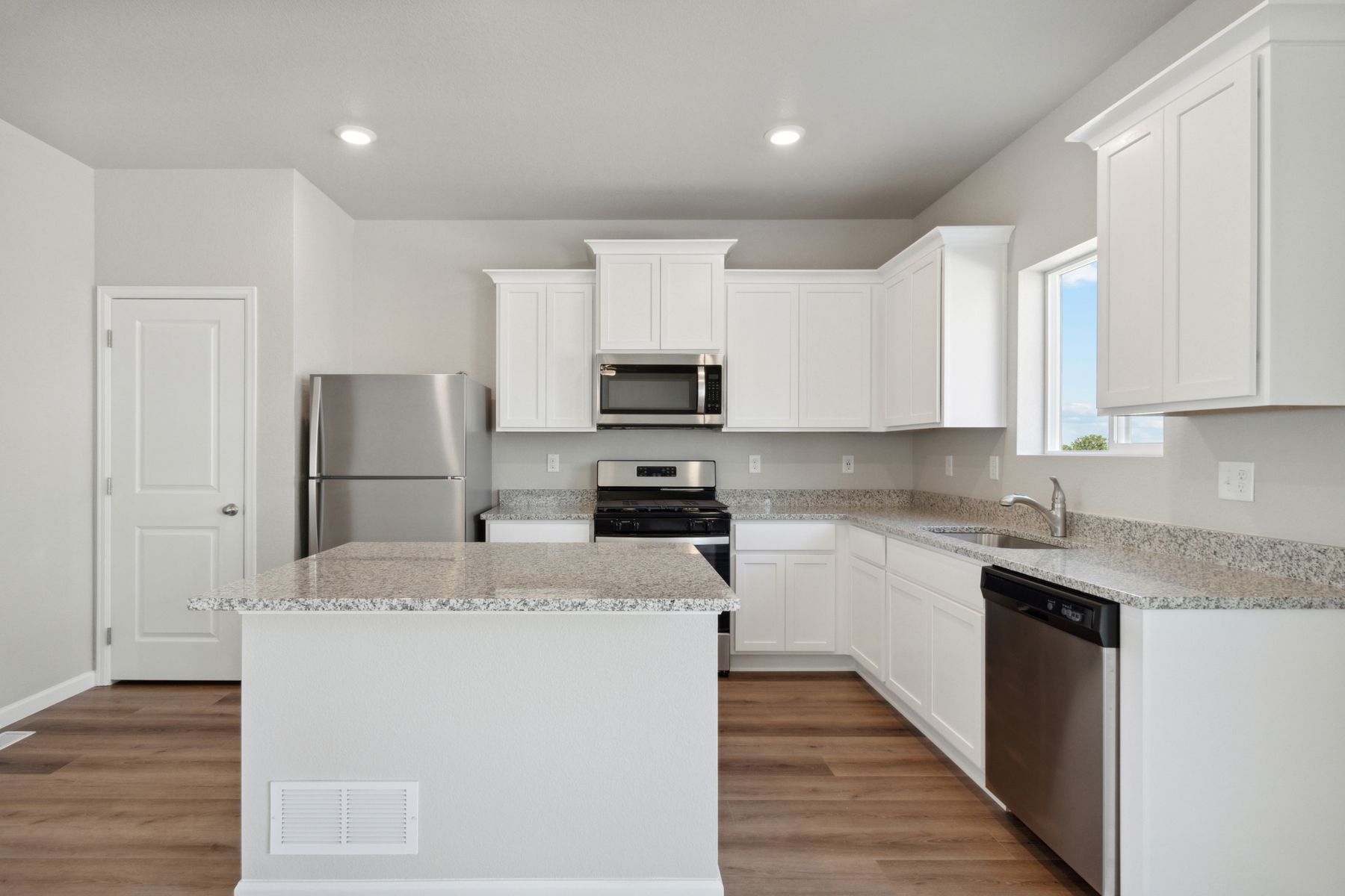 The kitchen of the Rio Grande has beautiful white cabinets.