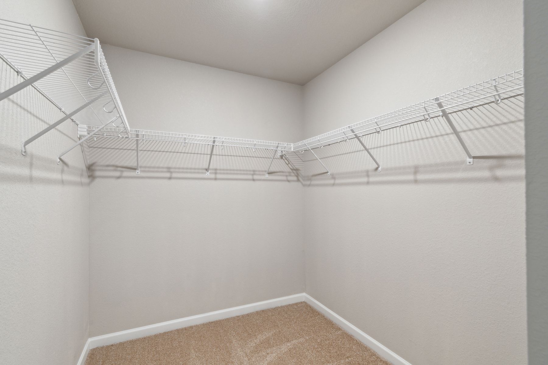 The walk-in, master closet is large and has enough space for all of your clothes, shoes and personal belongings.