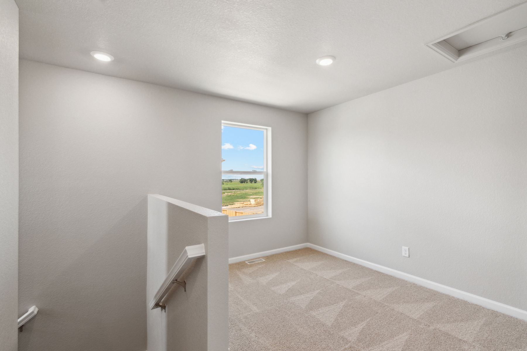 The upstairs loft is a great space for a game room.
