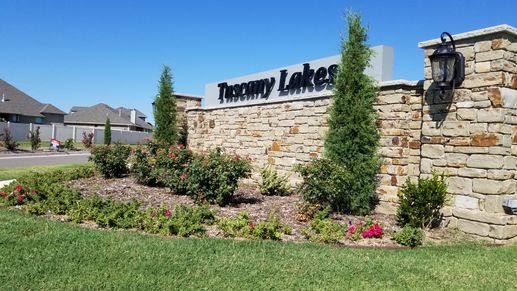 Tuscany Lakes monument at neighborhood entrance.