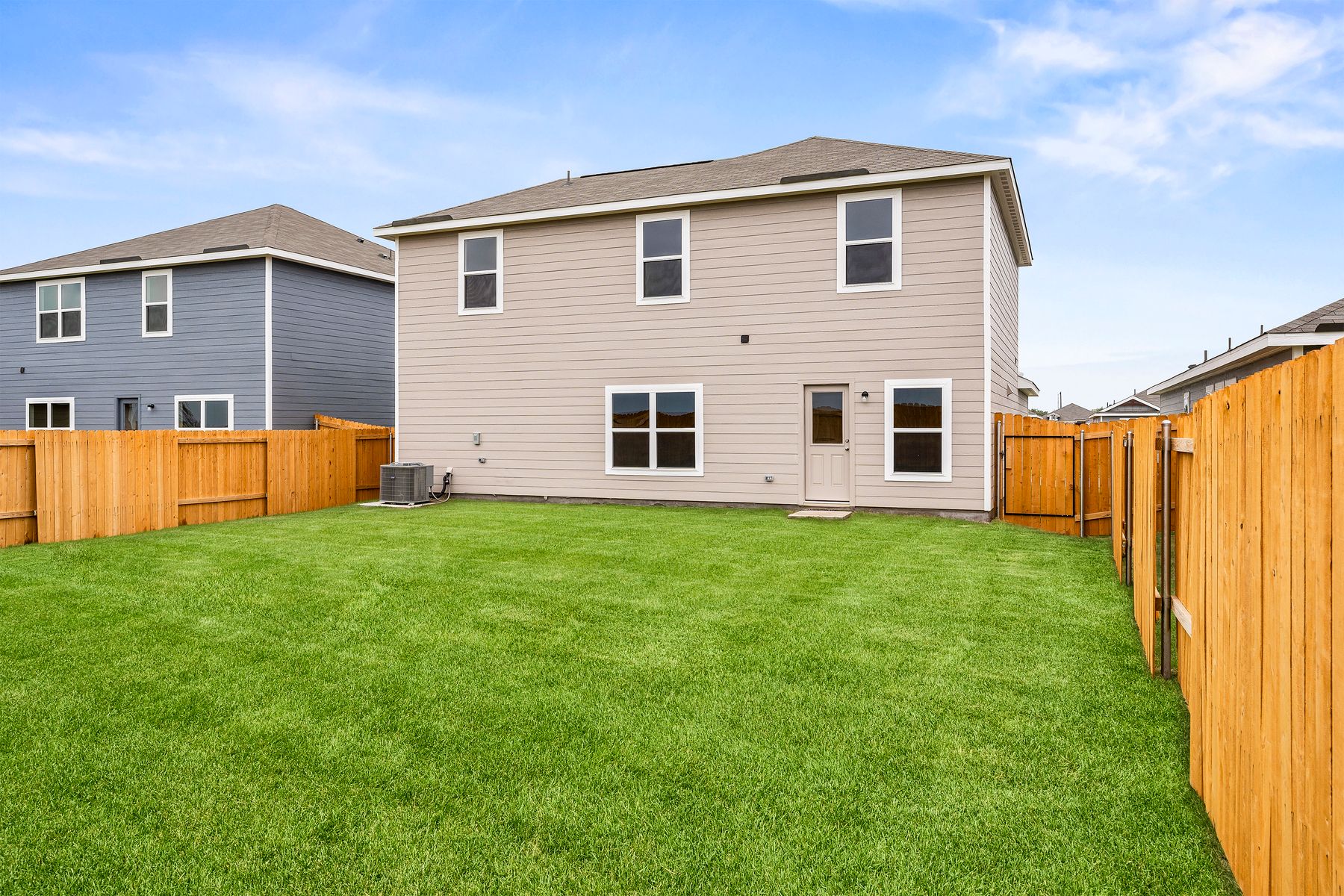 The backyard of the Cypress is fully fenced-in.