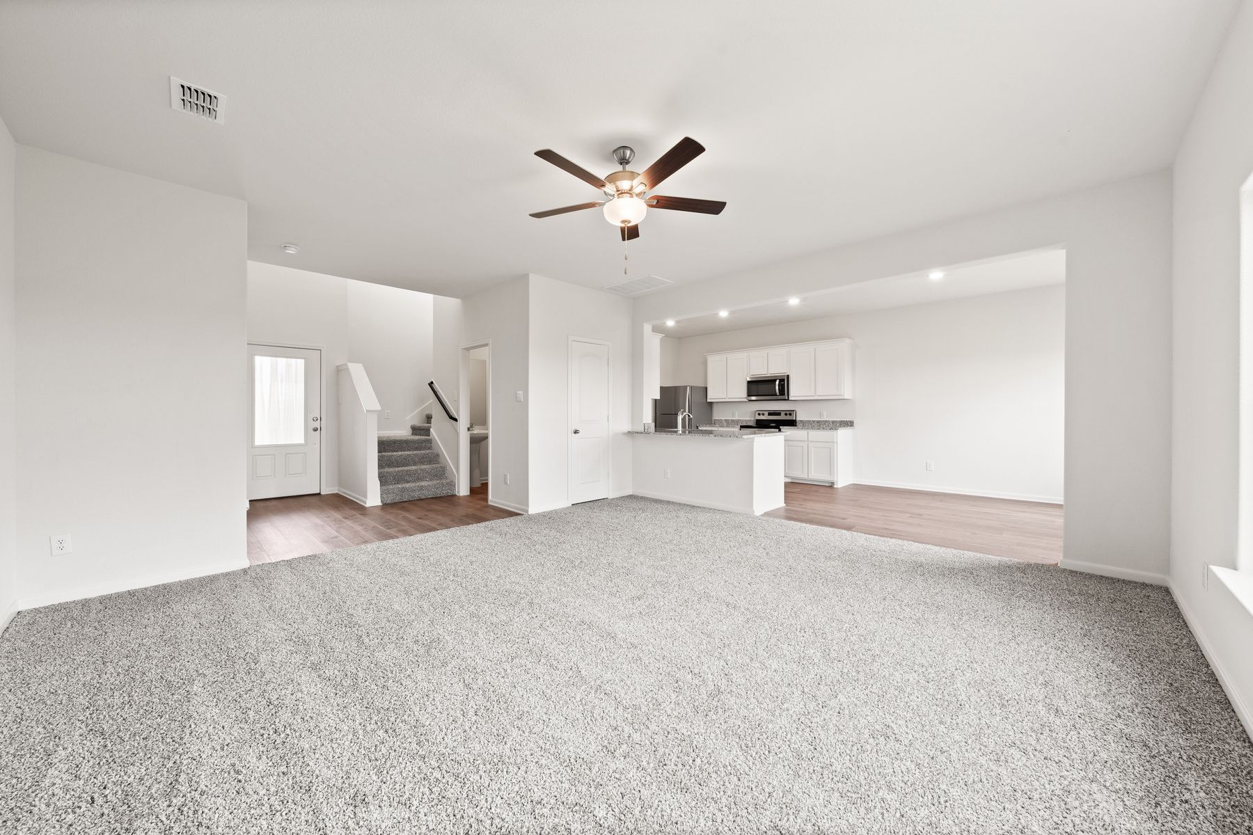 The Cypress floor plan is an open-concept layout.