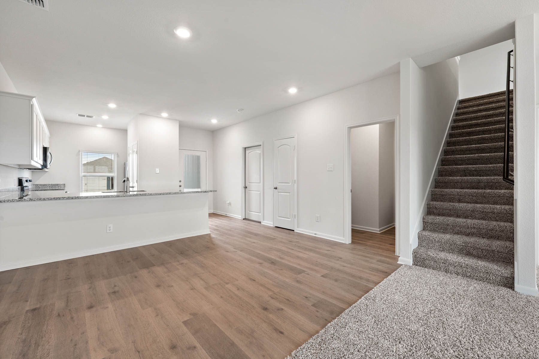 The Driftwood floor plan is an open-concept layout.