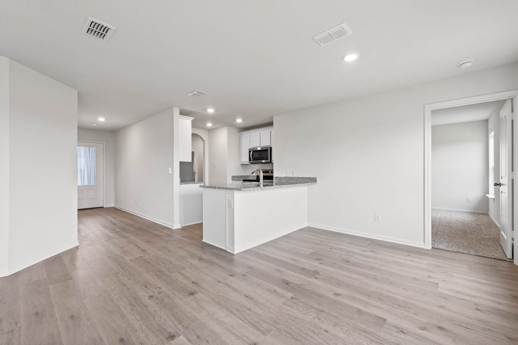 The Rio Grande floor plan has an open-concept layout.