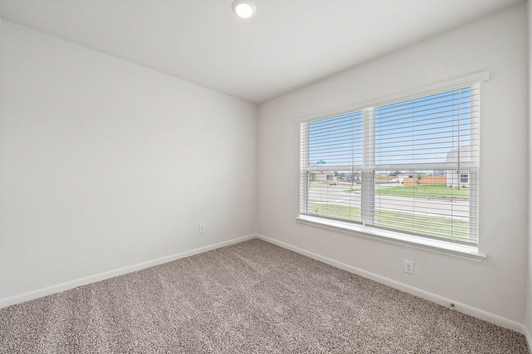 The secondary bedrooms are a great space for a child's bedroom or a guest room.