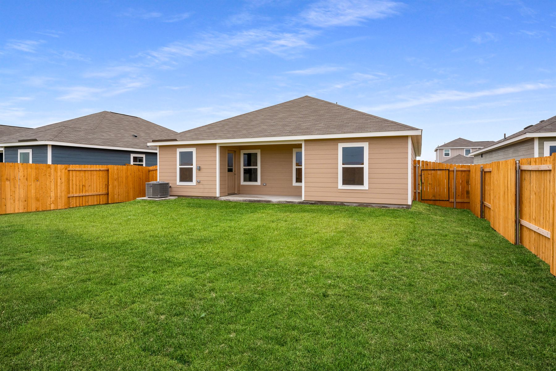The back yard of the Blanco is fenced-in.