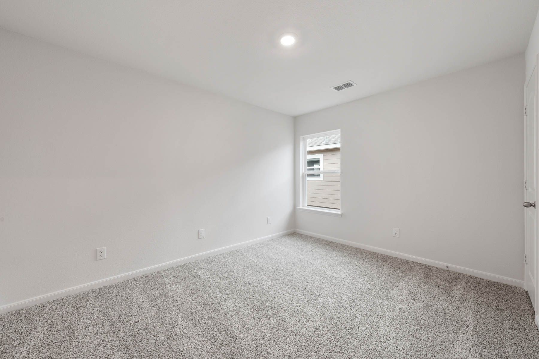 The secondary bedrooms are a great space for a child's bedroom or as a guest room.