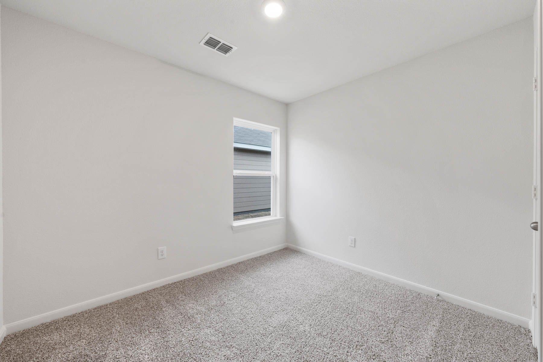 The Sabine has a large flex room that is a great space for an office or craft room.