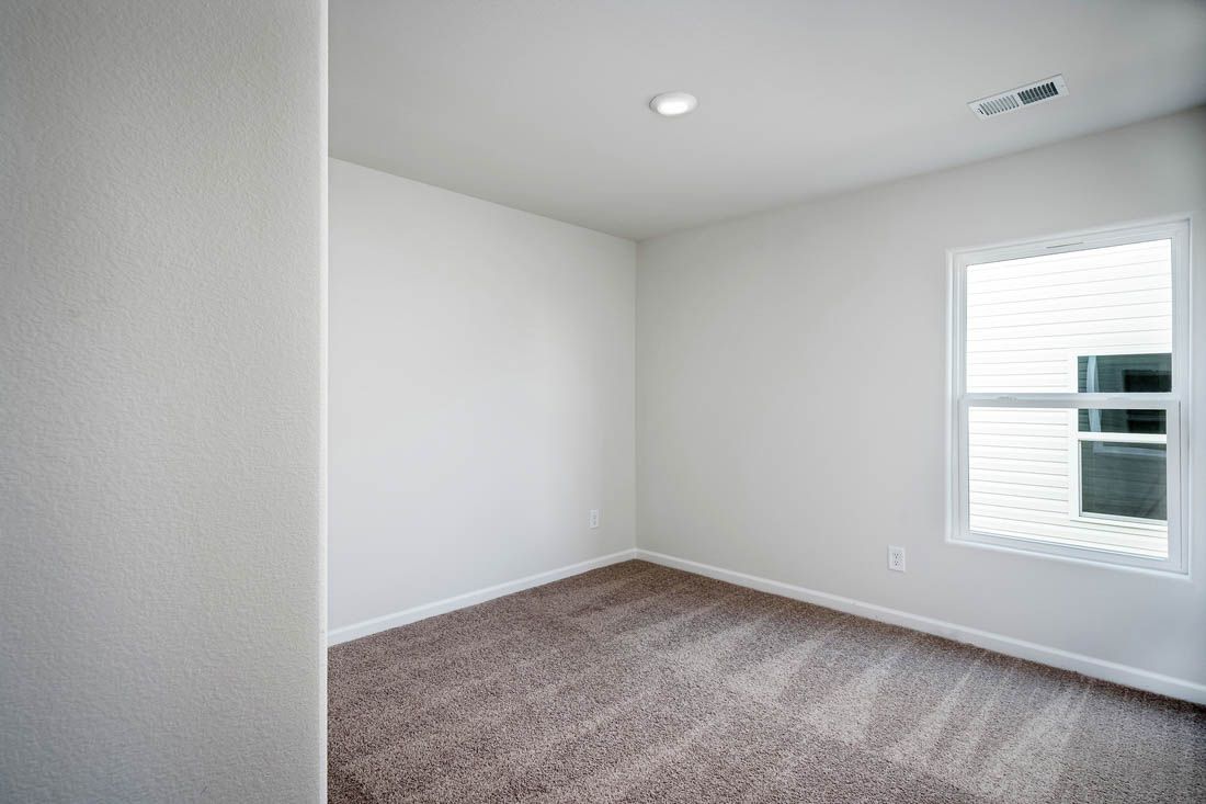 Bedroom with a large window