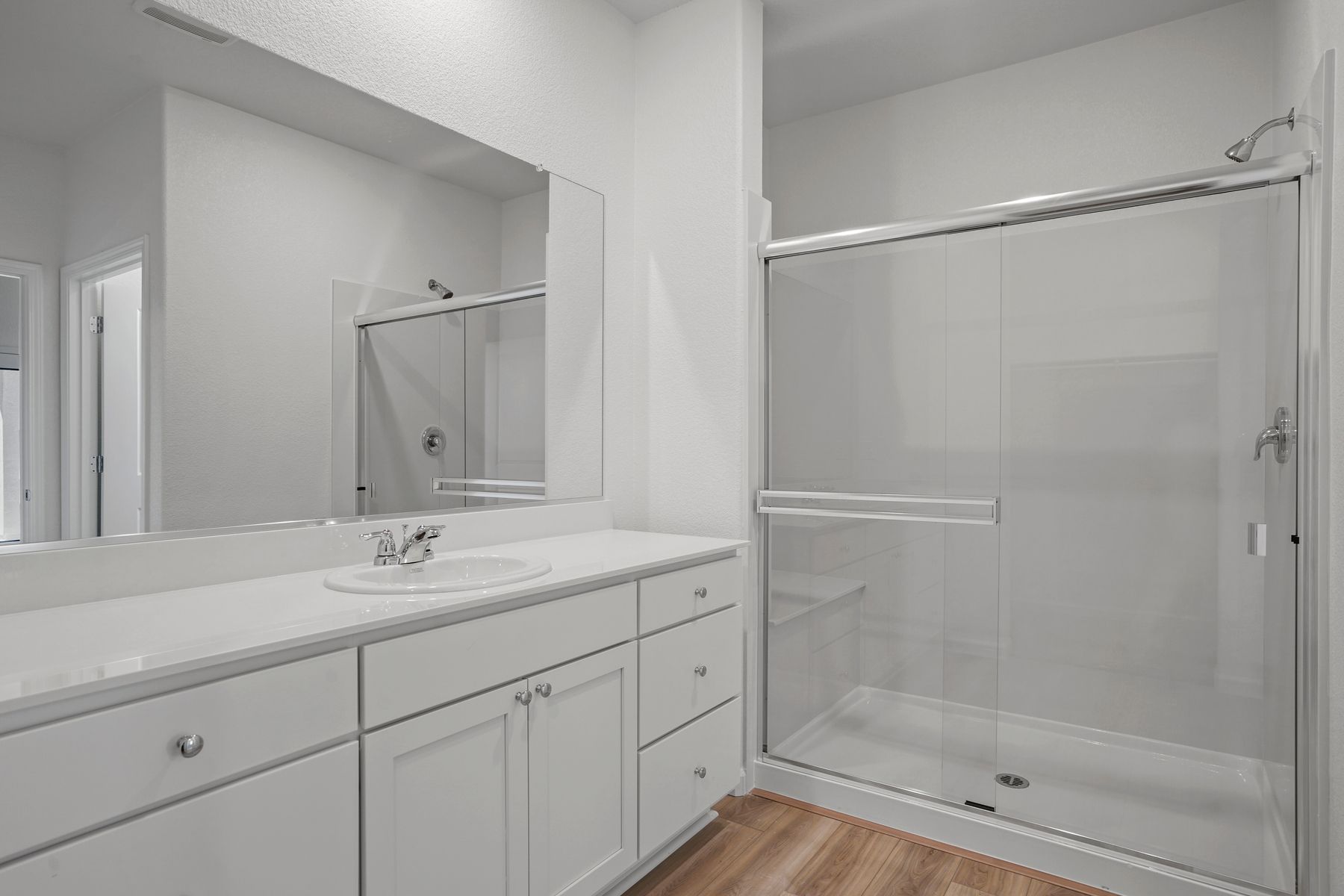 This elegant master bath is the perfect size and place for getting ready for the day.