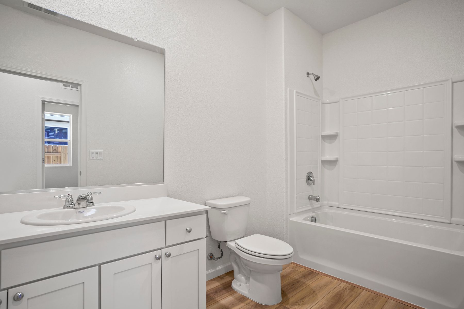 The bathroom is well-lit and fit for your every need