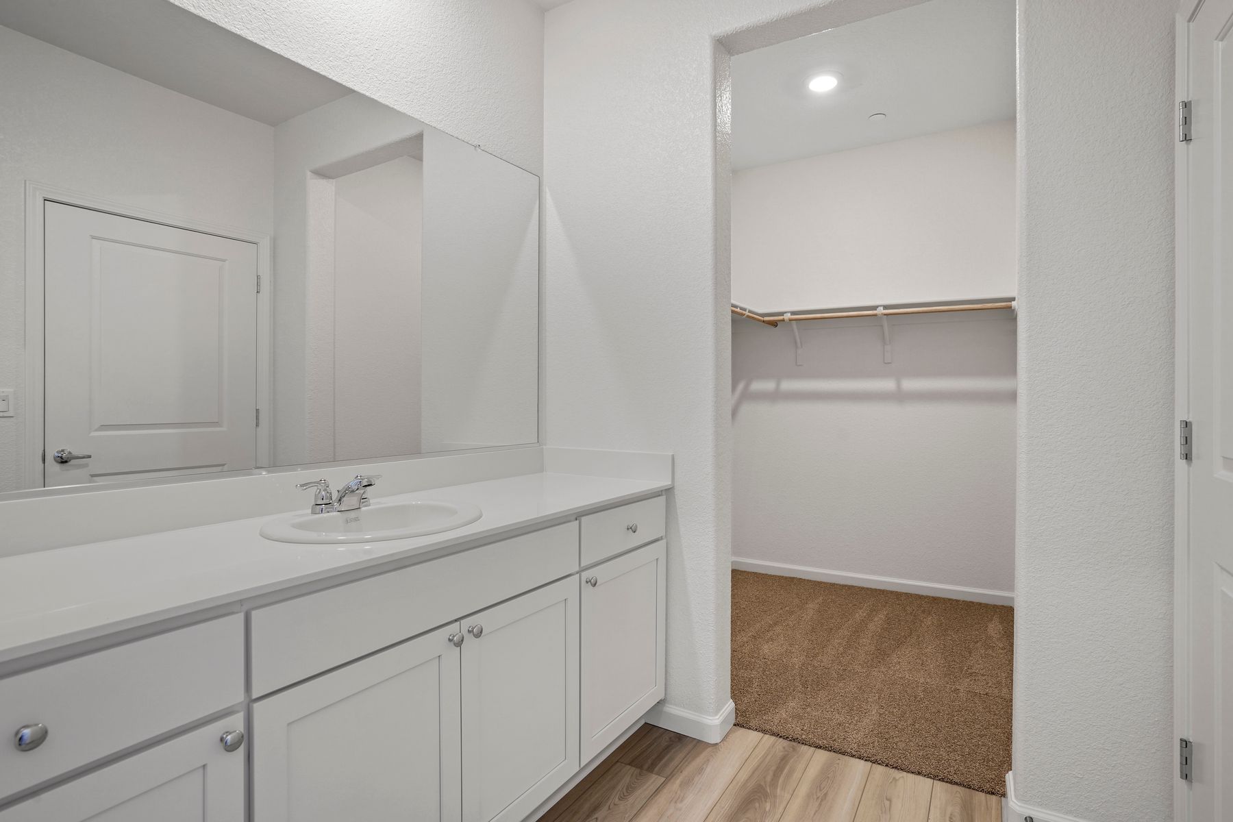 The spacious bathroom and closet combo are fit for your every need