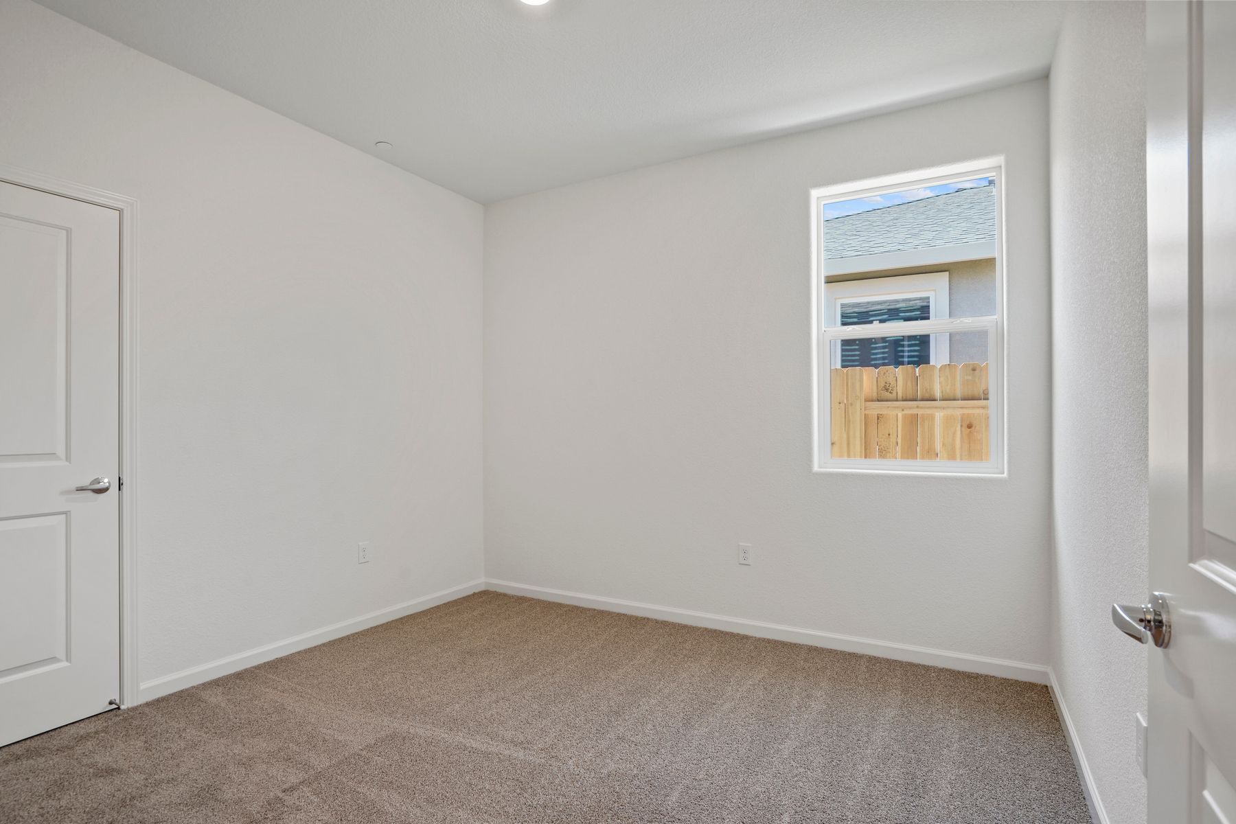 The additional bedroom has excellent natural lighting