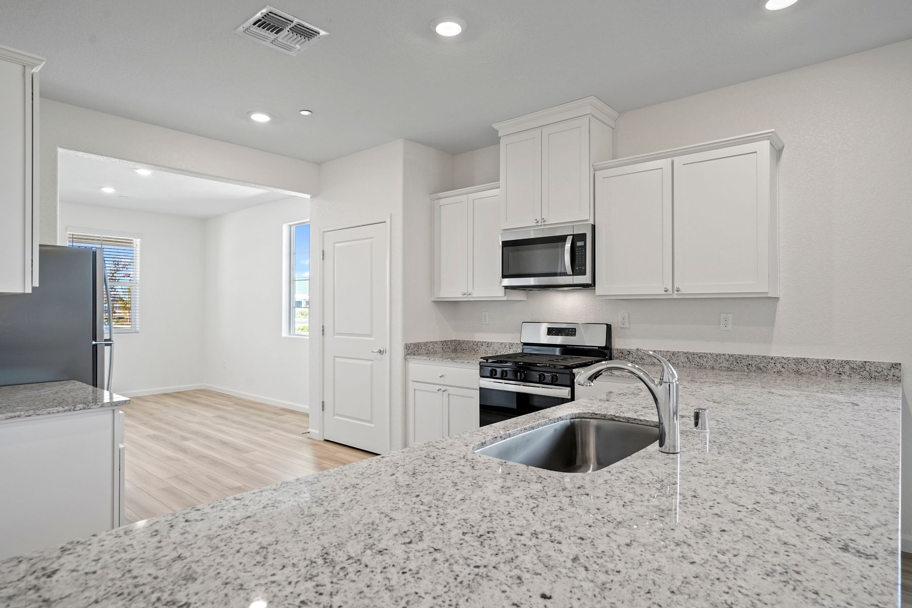 The kitchen also leads to the beautiful dining area