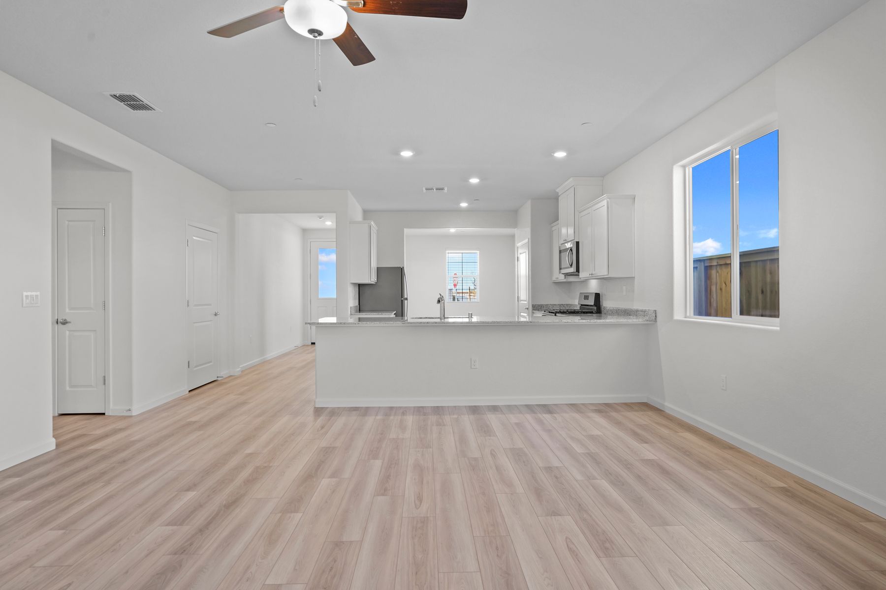 The spacious open floor plan creates the perfect family room and kitchen area perfect for family and friends to enjoy