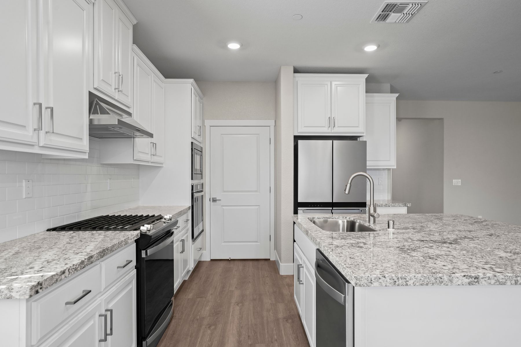 The kitchen has beautiful granite countertop